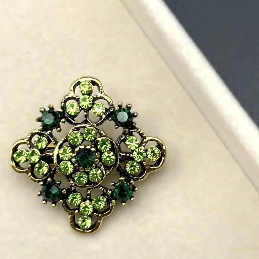 Yellow Gold with Emerald and Peridot Green Crystal Ornate Pin Back Brooch